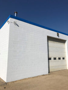 exterior painting of building in Westlock